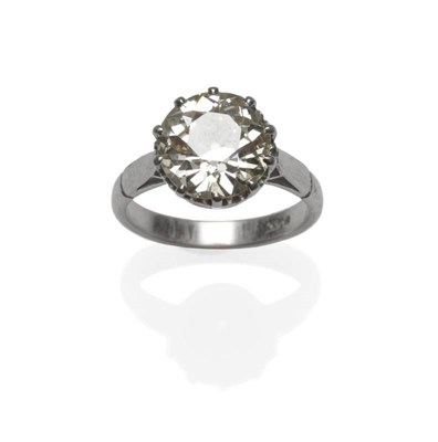 Lot 462 - An Early 20th Century Diamond Solitaire Ring, the old cut diamond in a white claw setting, to...