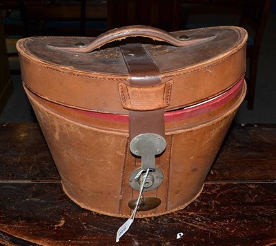 Lot 846 - Top hat in leather box