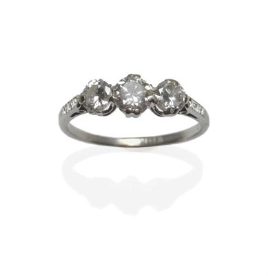 Lot 468 - A Diamond Three Stone Ring, circa 1930, the graduated brilliant cut diamonds in white claw settings