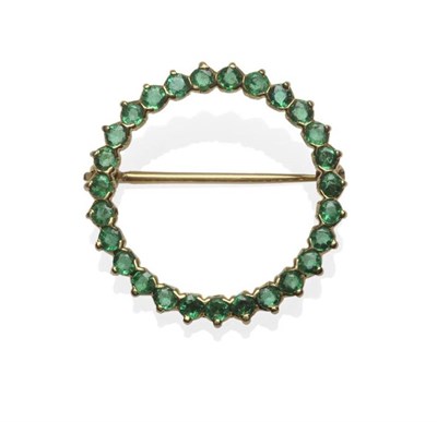 Lot 485 - An Emerald Hoop Brooch, marked Cartier, the round brilliant cut emeralds in yellow claw...