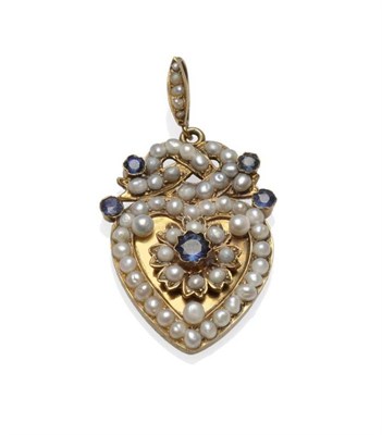 Lot 487 - A Sapphire and Pearl Heart Shaped Pendant, circa 1900, the faceted sapphires in collet...