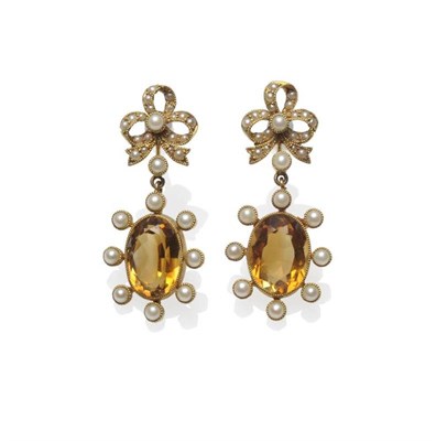 Lot 490 - A Pair of Citrine and Pearl Drop Earrings, a stud formed as a bow inset with seed pearls,...