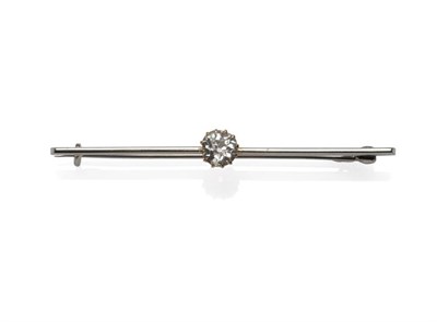 Lot 494 - A Diamond Bar Brooch, the old brilliant cut diamond centrally, in yellow tipped claw settings, to a