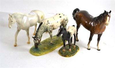 Lot 2 - Royal Doulton horse and pony collection Appaloosa mare RDA32 and foal RDA35, and two Beswick horses
