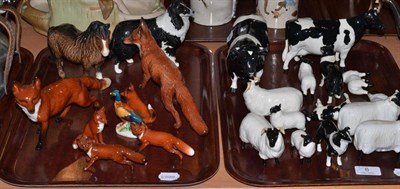 Lot 6 - A large collection of Beswick including Friesian cattle, foxes, sheep, collies etc (on two trays)