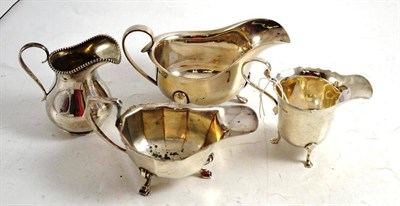 Lot 56 - Two silver sauce boats and two cream jugs