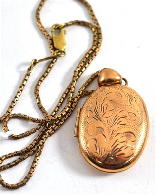 Lot 70 - A 9ct gold oval half engraved locket on a 9ct gold brick link style necklet