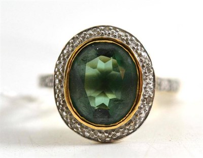 Lot 89 - A green stone ring, probably quartz