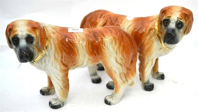 Lot 101 - A pair of Victorian Staffordshire St Bernard dogs, each with gilded collars in standing pose
