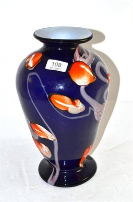 Lot 108 - A coloured blue glass art vase
