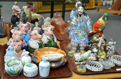 Lot 109 - Two trays including pair of warrior figures, imitation Chelsea porcelain figures, Wade piggy banks