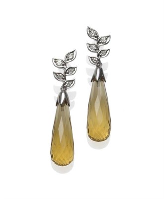 Lot 505 - A Pair of Citrine and Diamond Drop Earrings, a leaf motif stud set with five round brilliant...