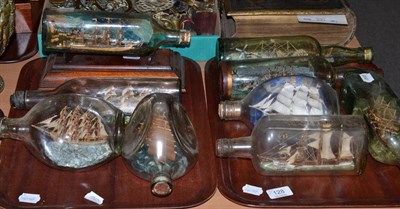 Lot 128 - Model ship in glass bottle on a mahogany stand and eight other examples (two trays)