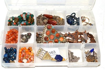 Lot 163 - A quantity of jewellery, some probably Afghani, including a lapis lazuli pendant, a coral set ring