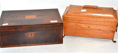 Lot 173 - 19th century mahogany writing slope and a tea caddy with lion mask handles and brass paw feet (2)