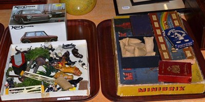 Lot 174 - Various figures and pastimes including painted animal figures, boxed games etc (on two trays)