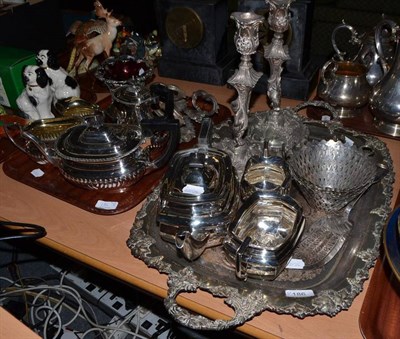 Lot 186 - Two trays of silver plate including a Hukin & Heath sugar bowl, a four piece tea service, a...