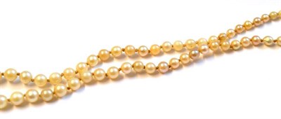 Lot 513 - A Strand of Graduated Pearls, one hundred and forty-five pearls knotted to a plain barrel...