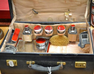 Lot 195 - Silver and red enamel dressing table pieces in fitted case