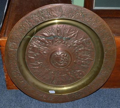 Lot 200 - An electrotype alms dish in brass and copper