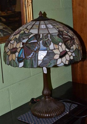 Lot 226 - A Tiffany style table lamp with large domed stained glass shade