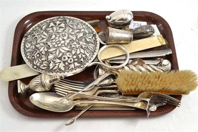 Lot 234 - Hand mirror with embossed plated mount, silver mounted clothes brush and combs, silver...