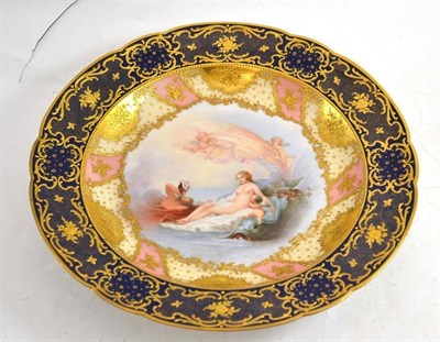 Lot 249 - A Vienna porcelain wall plaque painted with Classical figures within a gros bleu and raised...