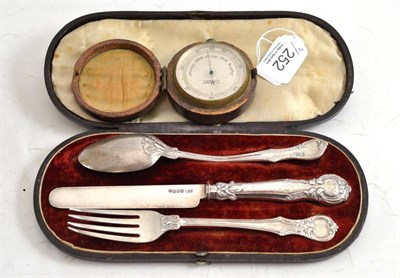 Lot 252 - Victorian cased three piece Christening set and a cased pocket barometer by CSSA Ltd London E C