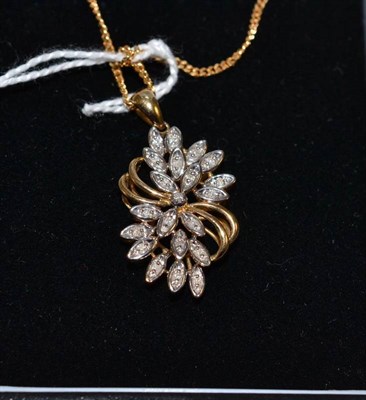 Lot 265 - A diamond set pendant on a 9ct gold chain