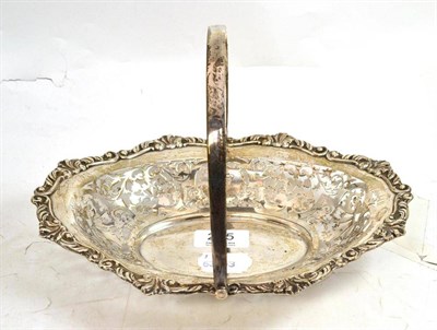 Lot 275 - George V silver basket with swing handle and pierced decoration