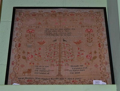 Lot 323 - A framed Adam and Eve sampler worked by Sarah Mafsey, aged 8 1835, worked in cross stitch with...