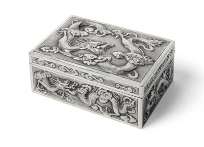 Lot 528 - A Chinese Silver Box, Wang Hing, Canton, circa 1890, rectangular, chased with dragons amidst clouds