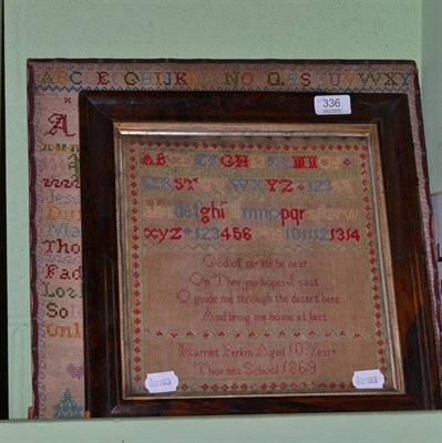 Lot 336 - A rosewood alphabet framed sampler worked by Harriet Perkin, aged 10 Thornes School 1869, with...