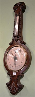 Lot 350 - An oak cased wheel barometer, J Long, London