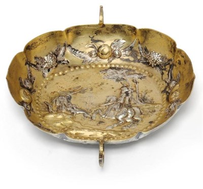 Lot 531 - An Augsburg Octalobed Two-Handled White Metal Shallow Dish, late 17th/early 18th century, gilt...