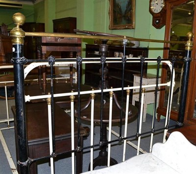 Lot 368 - Victorian black painted and brass mounted double bedstead and another painted cream