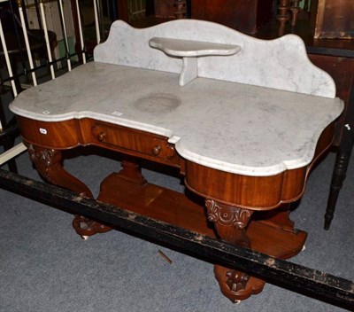 Lot 371 - A Victorian mahogany washstand with marble top