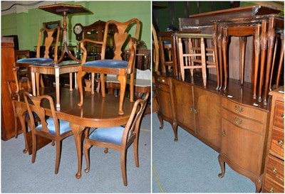 Lot 374 - A walnut dining room suite comprising: extending dining table, sideboard, six dining chairs,...