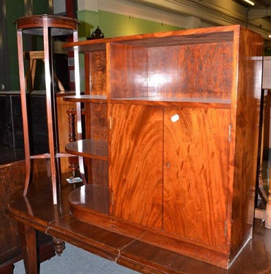 Lot 377 - An Art Deco cabinet with open bookshelves and a mahogany inlaid plant stand