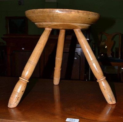 Lot 384 - A 19th century sycamore and ash turned stool