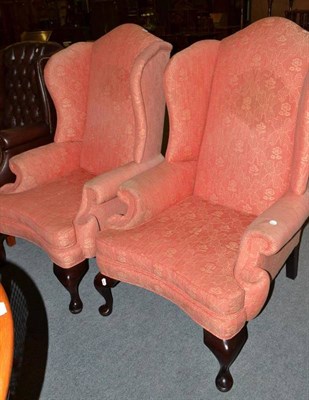 Lot 401 - Pair of mahogany framed upholstered wing armchairs