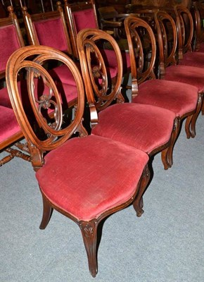 Lot 409 - Six Victorian walnut balloon back dining chairs