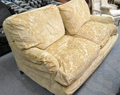 Lot 420 - Cream velvet devore upholstered two seater settee