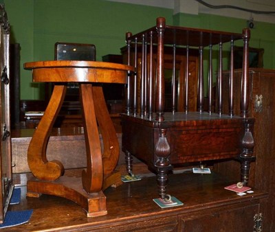 Lot 434 - Regency whatnot and a walnut veneered Continental circular table