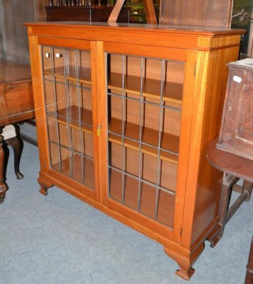 Lot 443 - Reproduction standing bookcase with glazed and leaded doors