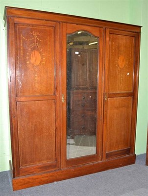 Lot 458 - Edwardian mahogany inlaid triple wardrobe