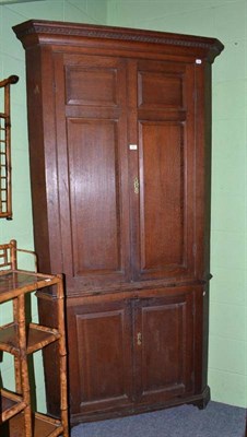 Lot 459 - Large Georgian oak standing corner cabinet