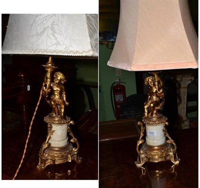 Lot 466 - Pair of French gilt metal and marble table lamps