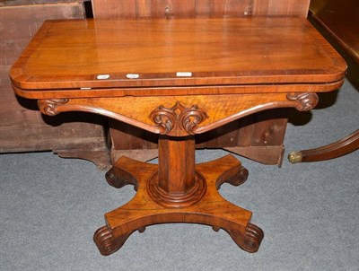 Lot 472 - 19th century mahogany inlaid folding games table