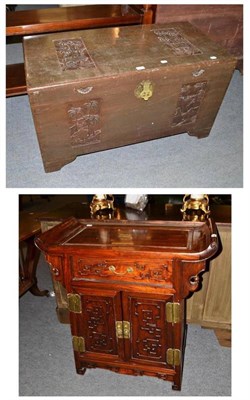 Lot 473 - A camphor wood chest with carved decoration and a modern Chinese side table